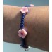 ARMBAND geknoopt BLAUW met 5 ROZE bloemetjes